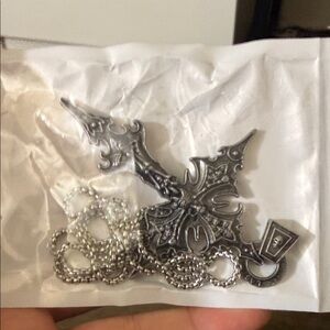 Richer Poorer Silver Ornate Brooch